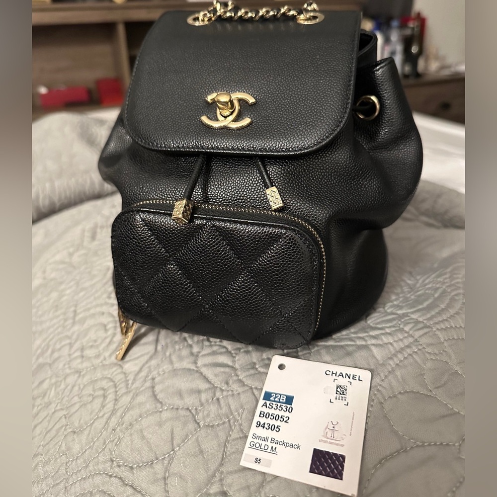 Chanel Black Quilted Backpack with Gold Accents